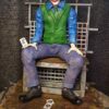 joker in prison statue 5